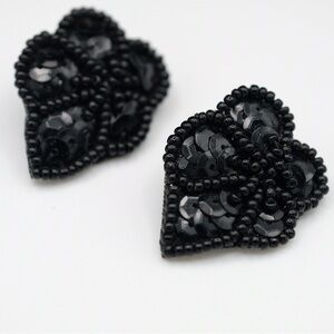 Gorgeous handmade beaded earrings with leather backing